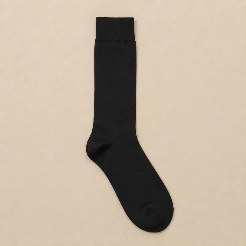 Black fine dress sock, laid flat